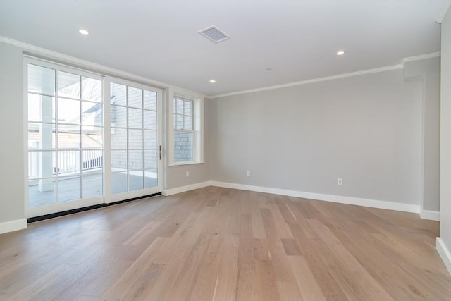 87 Elm St Unit 214, Cohasset, MA 02025 - empty room with baseboards, light wood-style flooring, visible vents, and crown molding