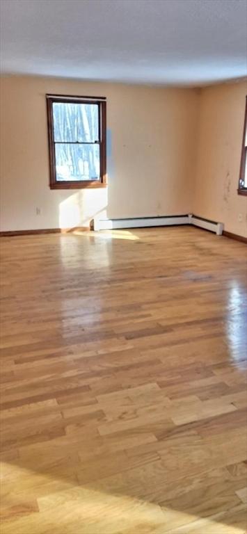 unfurnished room featuring light wood-type flooring