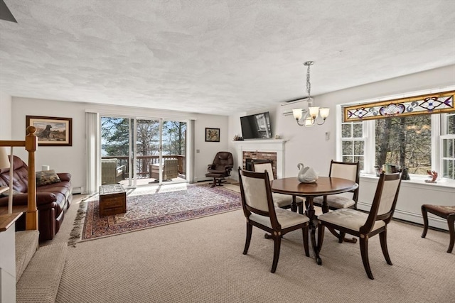 1 Calico Cir Unit 1, Dennis, MA 02639 - dining room with a chandelier, a textured ceiling, light colored carpet, and a wall mounted AC
