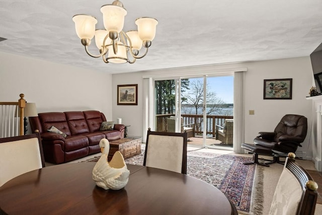 1 Calico Cir Unit 1, Dennis, MA 02639 - carpeted dining space with a chandelier