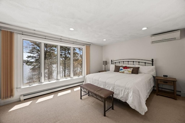 1 Calico Cir Unit 1, Dennis, MA 02639 - bedroom with a wall mounted air conditioner, carpet, and a baseboard radiator