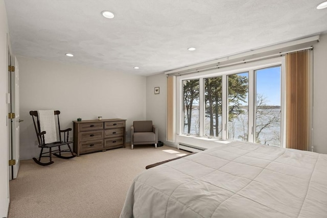 1 Calico Cir Unit 1, Dennis, MA 02639 - carpeted bedroom with a baseboard radiator and recessed lighting