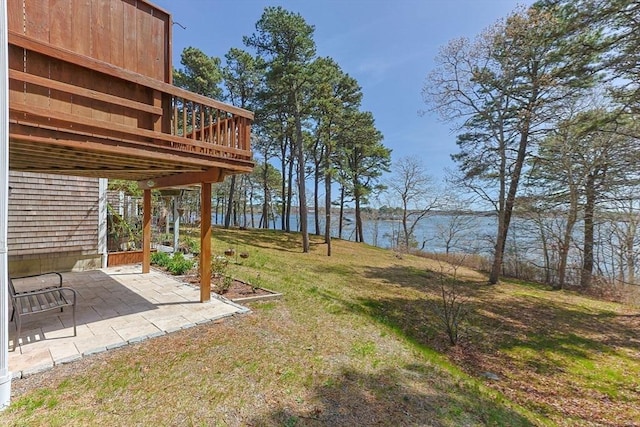 1 Calico Cir Unit 1, Dennis, MA 02639 - view of yard with a patio area and a deck with water view