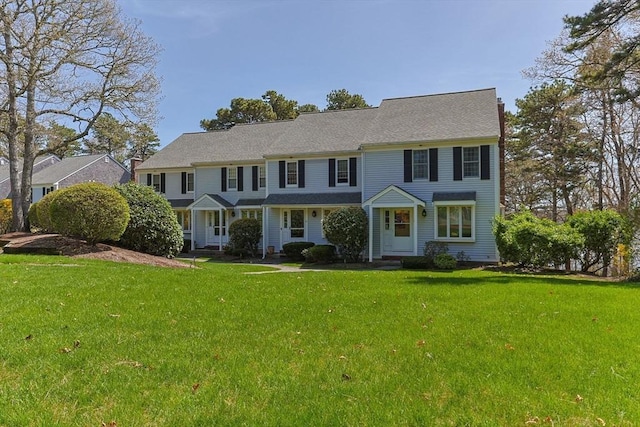 1 Calico Cir Unit 1, Dennis, MA 02639 - colonial-style house featuring a front yard