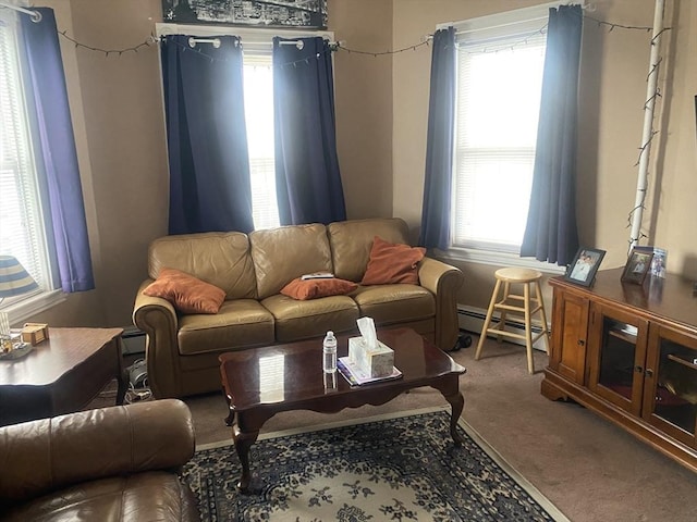 carpeted living room with a baseboard heating unit