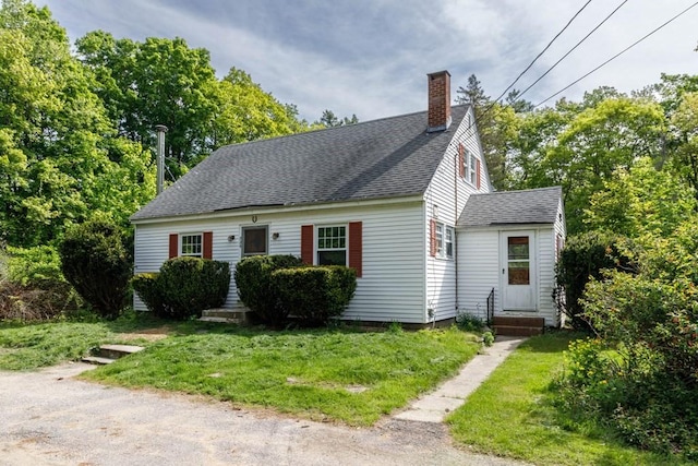326 Lake Rd, Ashburnham, MA 01430 - cape cod-style house with a chimney, a shingled roof, a front lawn, and entry steps