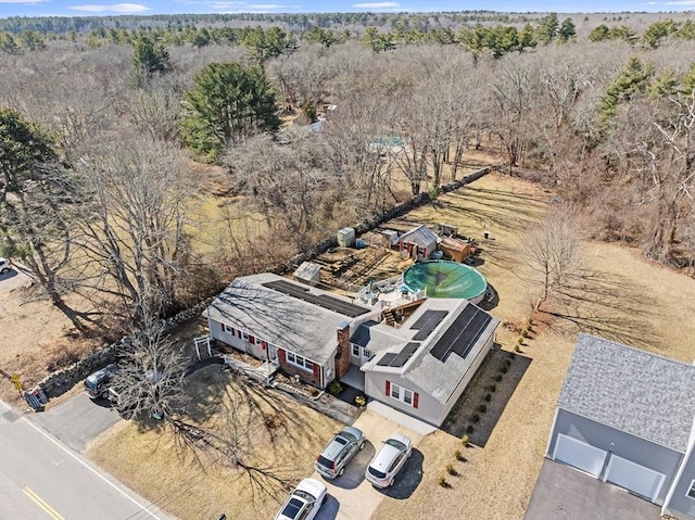 bird's eye view featuring a forest view