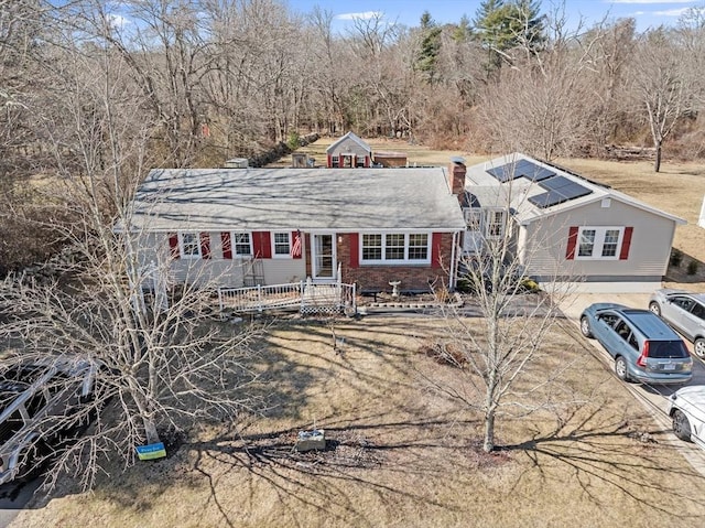 view of front of home featuring brick siding