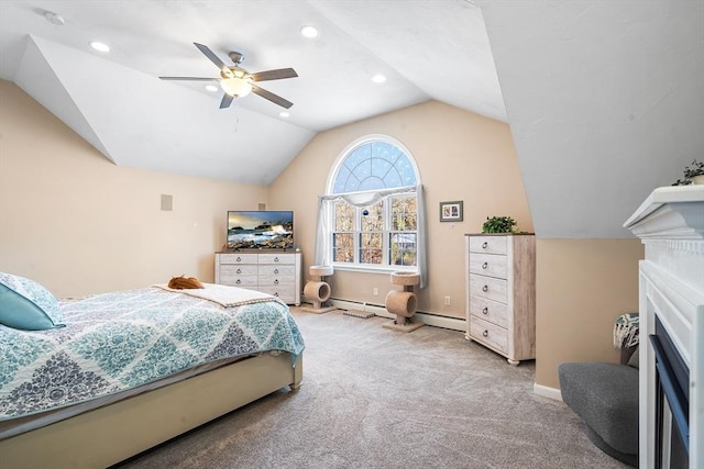 bedroom with a baseboard radiator, vaulted ceiling, light colored carpet, and ceiling fan