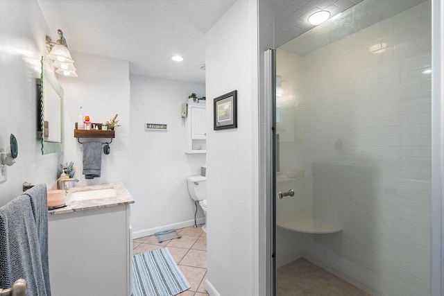 bathroom featuring vanity, an enclosed shower, tile patterned floors, and toilet