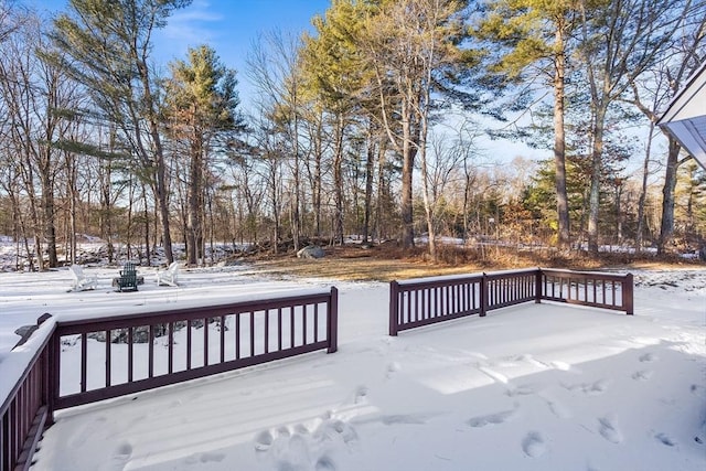 view of snow covered deck