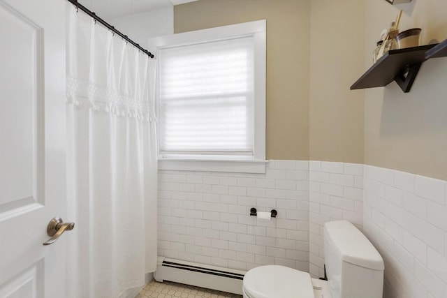 34 Warren St Unit 3, Stoneham, MA 02180 - full bath with a baseboard radiator, tile walls, curtained shower, and a wainscoted wall
