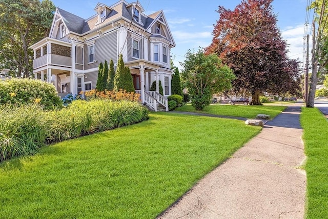 34 Warren St Unit 3, Stoneham, MA 02180 - view of front of property featuring a front lawn