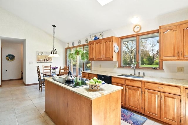 kitchen with a sink, a center island, decorative light fixtures, vaulted ceiling, and black appliances