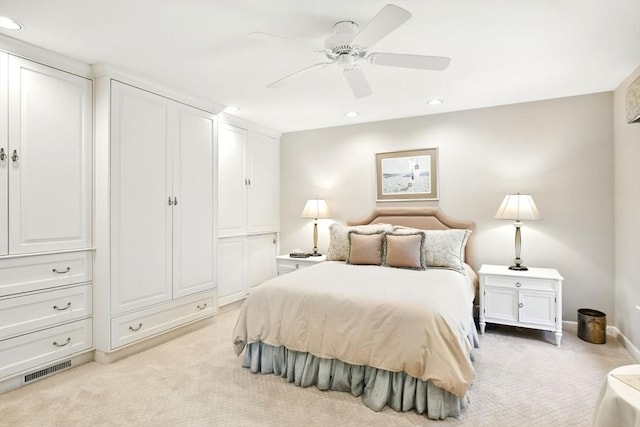bedroom with light carpet, recessed lighting, baseboards, a ceiling fan, and visible vents