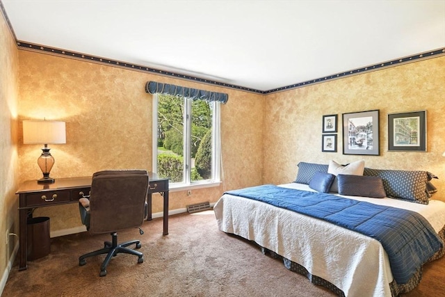 carpeted bedroom featuring baseboards and ornamental molding
