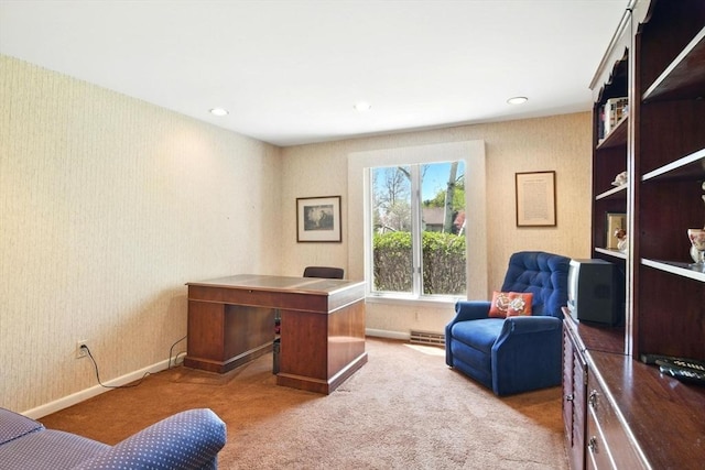 office space with carpet floors, baseboards, and wallpapered walls