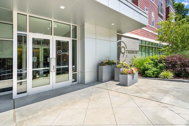 view of exterior entry featuring french doors