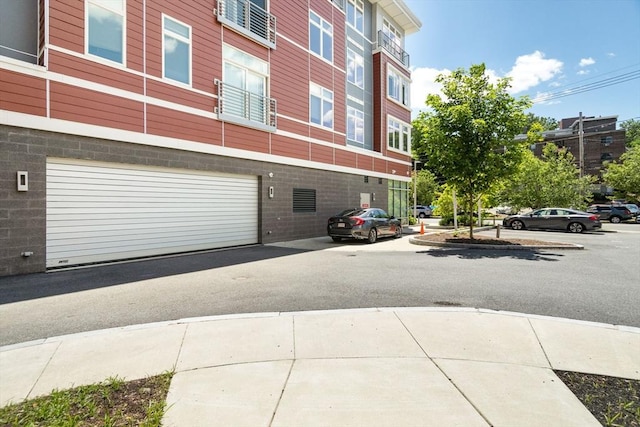 view of building exterior featuring a garage