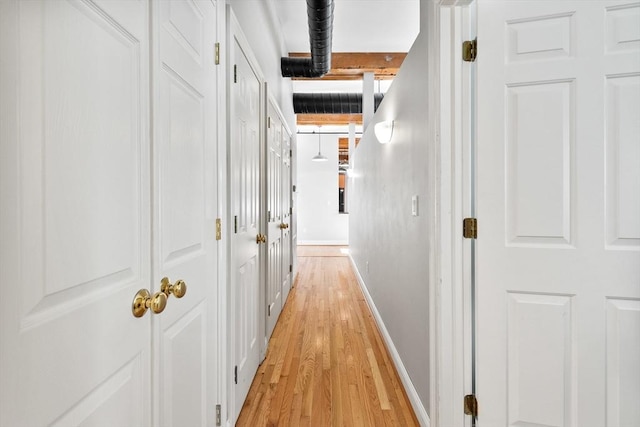 hallway featuring light wood-type flooring