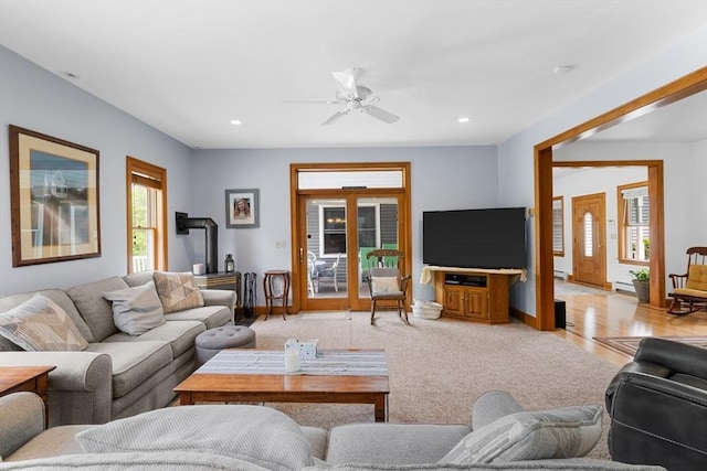 45 Pleasant St, Middleboro, MA 02346 - living room featuring a ceiling fan, recessed lighting, a baseboard heating unit, and light carpet
