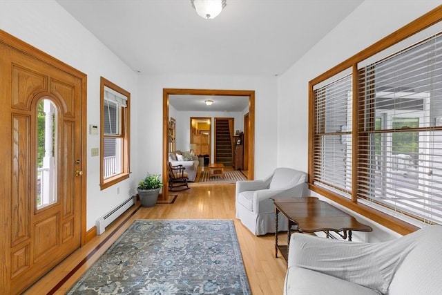 45 Pleasant St, Middleboro, MA 02346 - entrance foyer featuring baseboard heating and light wood finished floors