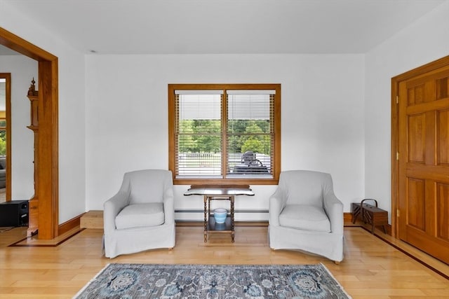 45 Pleasant St, Middleboro, MA 02346 - sitting room with healthy amount of natural light, wood finished floors, and baseboard heating