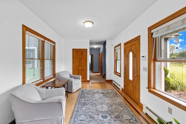 45 Pleasant St, Middleboro, MA 02346 - entrance foyer with light wood finished floors and baseboard heating