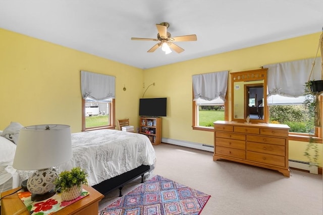 45 Pleasant St, Middleboro, MA 02346 - bedroom with a baseboard heating unit, multiple windows, and carpet flooring
