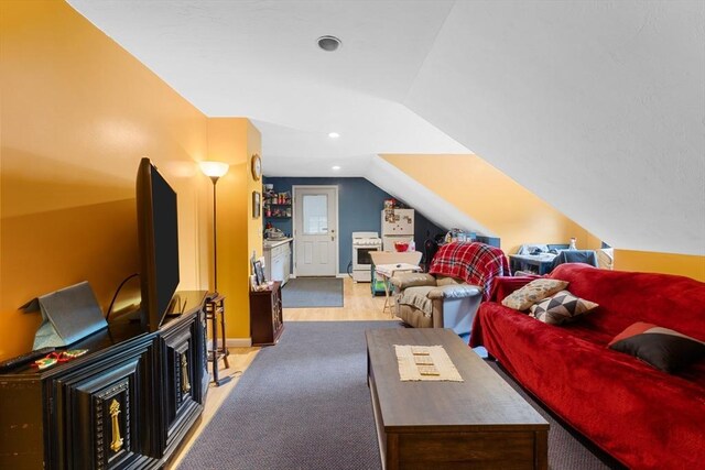 45 Pleasant St, Middleboro, MA 02346 - carpeted living room with vaulted ceiling and baseboards