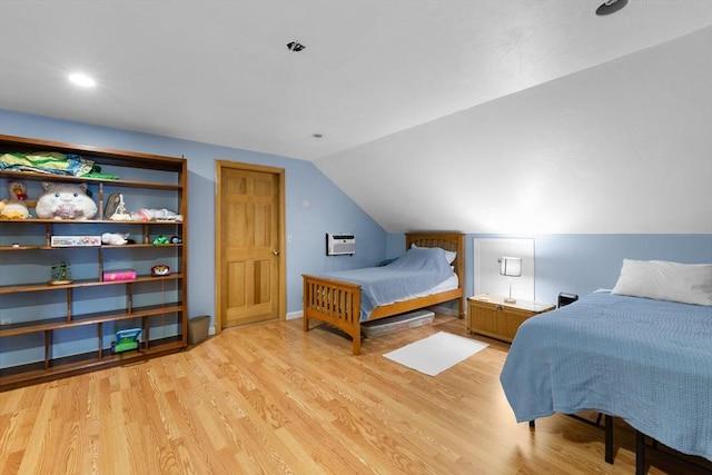 45 Pleasant St, Middleboro, MA 02346 - bedroom with light wood finished floors, lofted ceiling, a wall unit AC, and recessed lighting