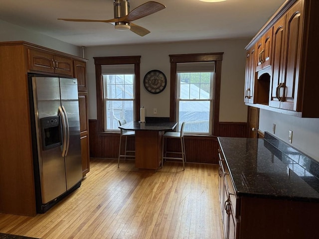 612 Grove St Lot 1, Worcester, MA 01605 - kitchen with stainless steel refrigerator with ice dispenser, wainscoting, ceiling fan, light wood-type flooring, and dark stone countertops