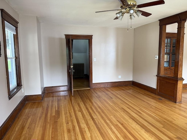 612 Grove St Lot 1, Worcester, MA 01605 - empty room with light wood-type flooring, radiator, a ceiling fan, and baseboards