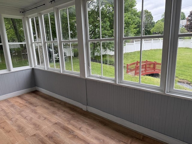 612 Grove St Lot 1, Worcester, MA 01605 - unfurnished sunroom featuring wood finished floors, healthy amount of natural light, and baseboards