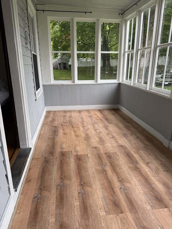 612 Grove St Lot 1, Worcester, MA 01605 - unfurnished sunroom with wood finished floors and baseboards
