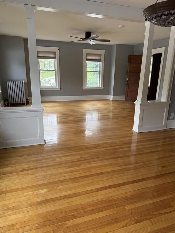 612 Grove St Lot 1, Worcester, MA 01605 - spare room featuring baseboards, light wood-style flooring, healthy amount of natural light, and ornate columns