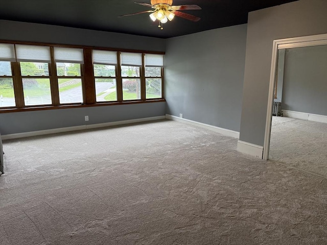 612 Grove St Lot 1, Worcester, MA 01605 - empty room featuring carpet flooring, a ceiling fan, and baseboards