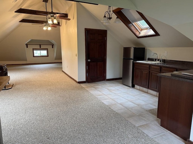 612 Grove St Lot 1, Worcester, MA 01605 - additional living space with a skylight, vaulted ceiling, a sink, light carpet, and ceiling fan