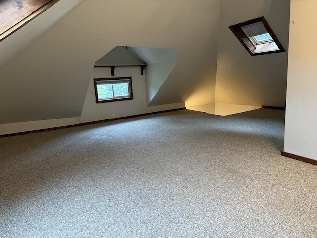 612 Grove St Lot 1, Worcester, MA 01605 - additional living space with carpet floors, a skylight, baseboards, and lofted ceiling
