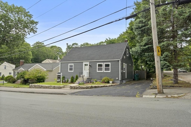 96 Hurd St, Lynn, MA 01905 - view of front facade with a shingled roof and driveway