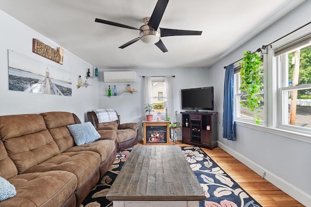 96 Hurd St, Lynn, MA 01905 - living room featuring plenty of natural light, a ceiling fan, and light wood-style flooring