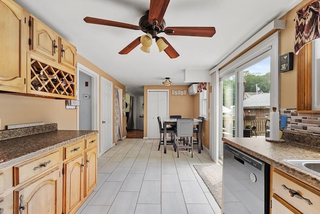 96 Hurd St, Lynn, MA 01905 - kitchen with dishwashing machine, dark countertops, ceiling fan, decorative backsplash, and light tile patterned floors