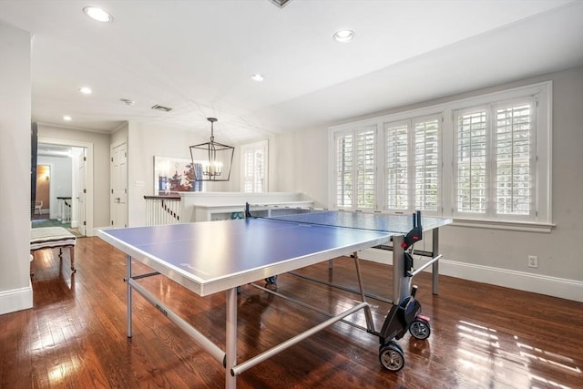 playroom featuring recessed lighting, baseboards, an inviting chandelier, and hardwood / wood-style floors