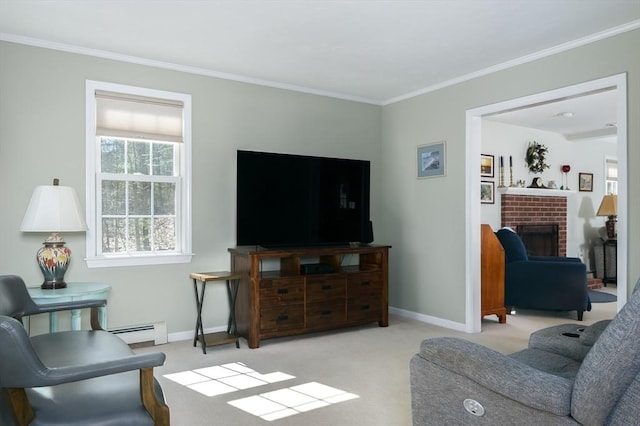 carpeted living area featuring a baseboard heating unit, crown molding, and baseboards