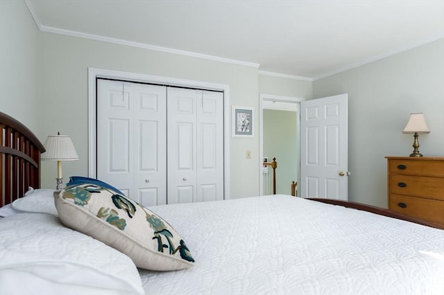 bedroom featuring a closet and crown molding