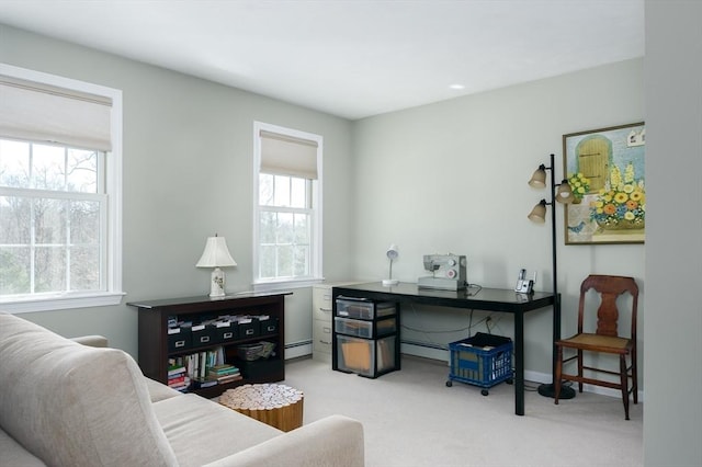 interior space with light carpet and baseboard heating