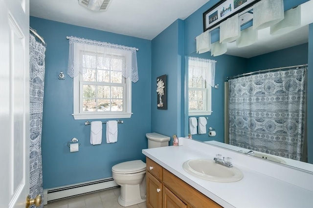 bathroom with toilet, a baseboard radiator, vanity, and visible vents