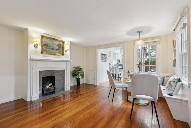 dining room with dark hardwood / wood-style floors