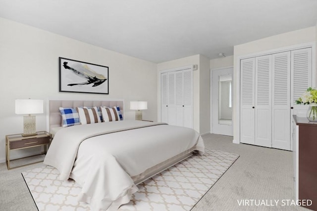 280 Boylston St Unit 110, Newton, MA 02467 - bedroom with two closets and carpet