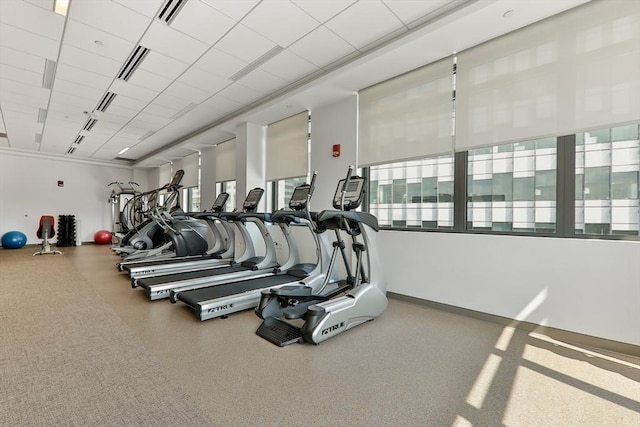 gym featuring visible vents and baseboards